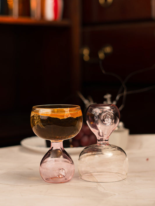 Elegant Blossom Orb dessert coupe in clear pink, perfect for serving cocktails, desserts, and champagne